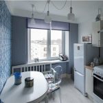 Овальный стол в интерьере кухни